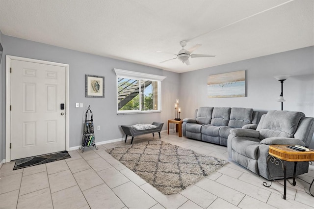 614 Guild Dr Unit 10, Venice, FL 34285 - living area featuring ceiling fan and light tile patterned floors
