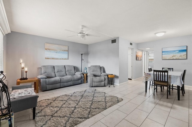 614 Guild Dr Unit 10, Venice, FL 34285 - living room with a ceiling fan and light tile patterned flooring