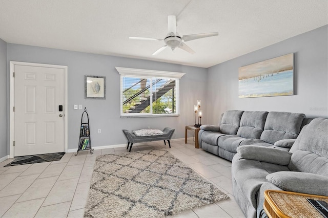 614 Guild Dr Unit 10, Venice, FL 34285 - living area with light tile patterned flooring and ceiling fan