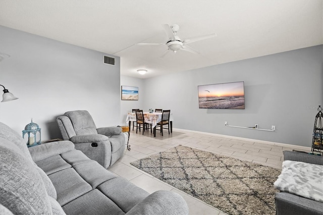614 Guild Dr Unit 10, Venice, FL 34285 - living room featuring light tile patterned flooring and ceiling fan