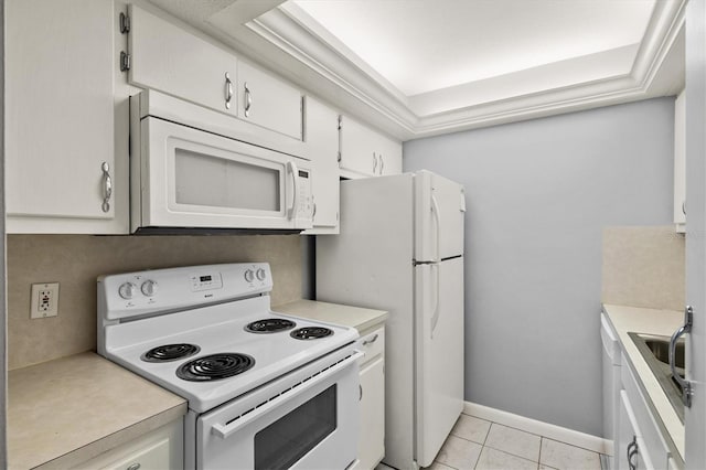 614 Guild Dr Unit 10, Venice, FL 34285 - kitchen with white appliances, light countertops, and white cabinets