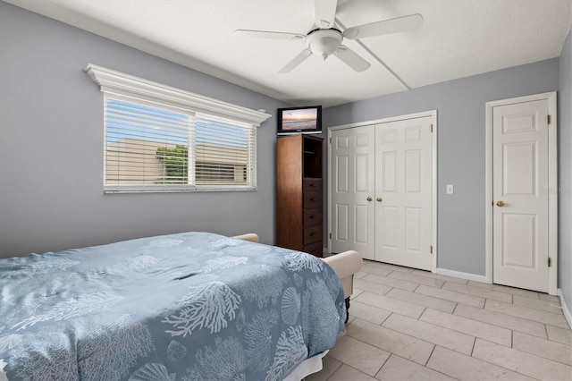 614 Guild Dr Unit 10, Venice, FL 34285 - bedroom with ceiling fan and baseboards
