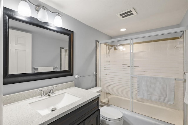 614 Guild Dr Unit 10, Venice, FL 34285 - full bathroom featuring vanity, enclosed tub / shower combo, and recessed lighting