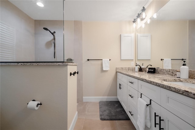 7257 Maguire Ln, Englewood, FL 34224 - bathroom with double vanity, walk in shower, and tile patterned floors