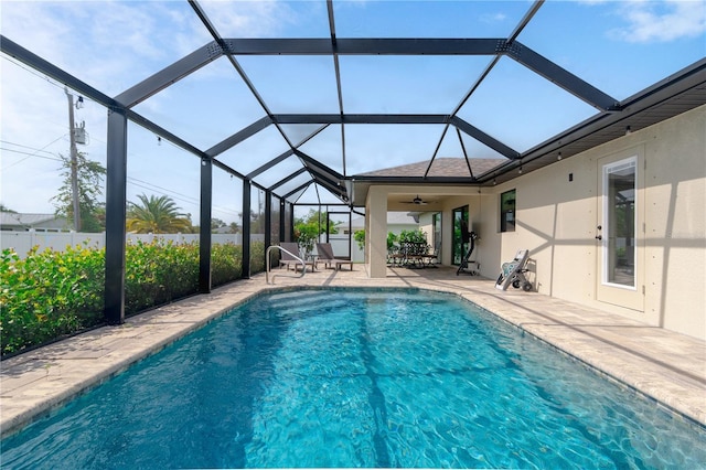 7257 Maguire Ln, Englewood, FL 34224 - outdoor pool with a patio and a ceiling fan
