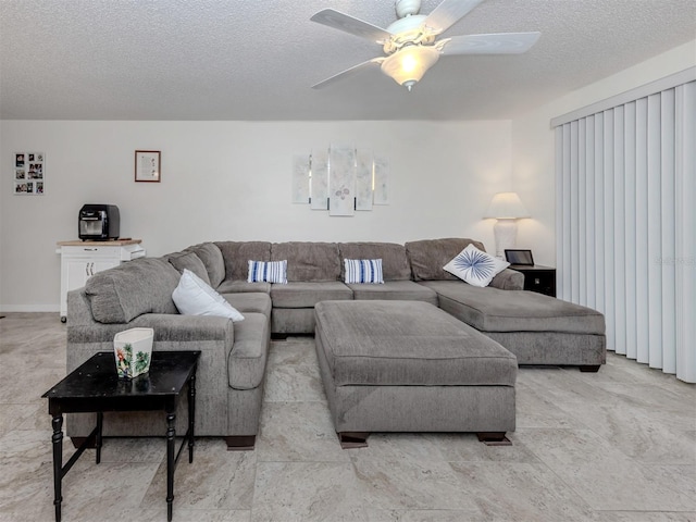 401 Airport Ave E Unit 304, Venice, FL 34285 - living area with a textured ceiling and ceiling fan