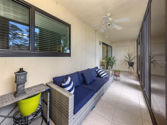 401 Airport Ave E Unit 304, Venice, FL 34285 - view of patio / terrace featuring ceiling fan and an outdoor hangout area