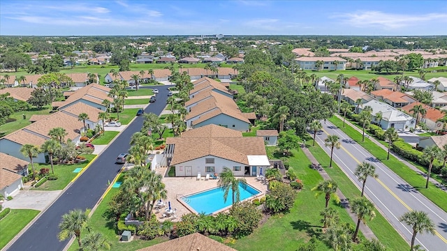 1211 Capri Isles Blvd Unit 6, Venice, FL 34292 - aerial perspective of suburban area featuring a pool area