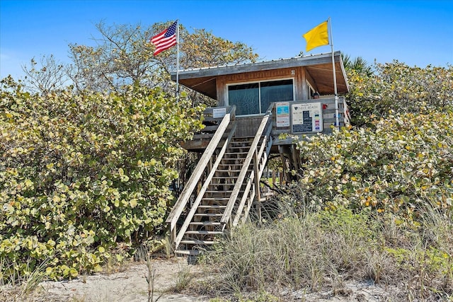 1211 Capri Isles Blvd Unit 6, Venice, FL 34292 - view of side of home featuring stairway
