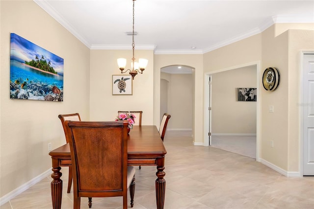 12187 Amica Loop, Venice, FL 34293 - dining space with arched walkways, crown molding, and a chandelier