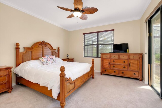 12187 Amica Loop, Venice, FL 34293 - bedroom with light carpet, access to exterior, crown molding, and ceiling fan