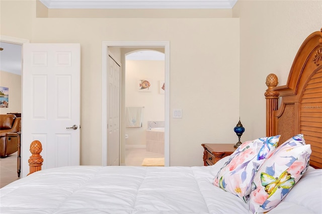 12187 Amica Loop, Venice, FL 34293 - bedroom with crown molding and ensuite bathroom