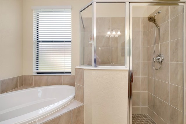 12187 Amica Loop, Venice, FL 34293 - bathroom with a garden tub and a stall shower