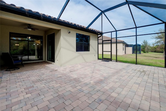 12187 Amica Loop, Venice, FL 34293 - view of patio / terrace with ceiling fan and glass enclosure