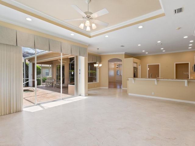 355 Swallow Cir, Venice, FL 34285 - unfurnished living room with ornamental molding, recessed lighting, arched walkways, a chandelier, and a ceiling fan