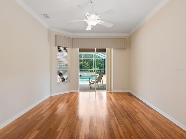 355 Swallow Cir, Venice, FL 34285 - empty room featuring light wood-type flooring, ceiling fan, a sunroom, and ornamental molding