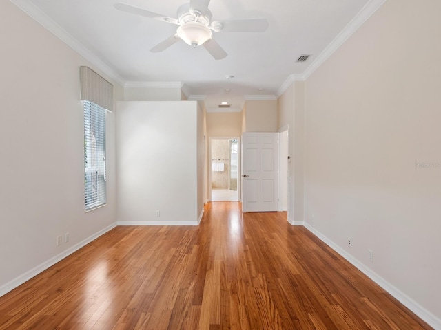 355 Swallow Cir, Venice, FL 34285 - spare room with light wood-style floors, crown molding, and a ceiling fan