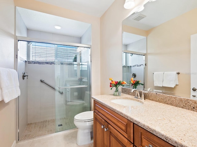 355 Swallow Cir, Venice, FL 34285 - bathroom with vanity, a stall shower, and tile patterned flooring