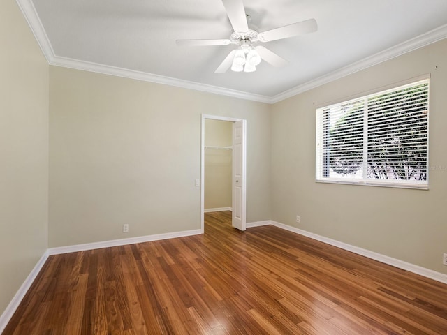 355 Swallow Cir, Venice, FL 34285 - empty room with ornamental molding, wood finished floors, and ceiling fan