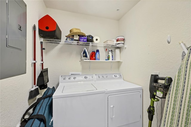 700 Gardens Edge Dr Unit 722, Venice, FL 34285 - laundry area featuring electric panel, independent washer and dryer, and a textured wall