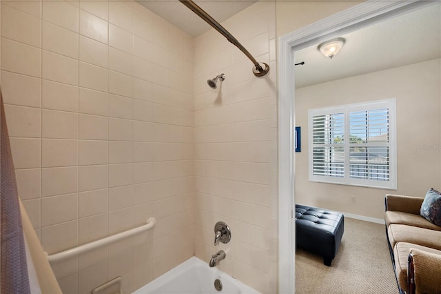 700 Gardens Edge Dr Unit 722, Venice, FL 34285 - ensuite bathroom featuring bathtub / shower combination and baseboards