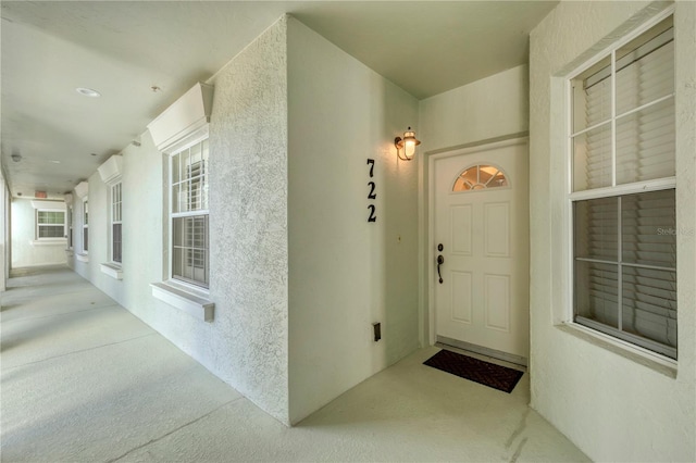 700 Gardens Edge Dr Unit 722, Venice, FL 34285 - property entrance with stucco siding