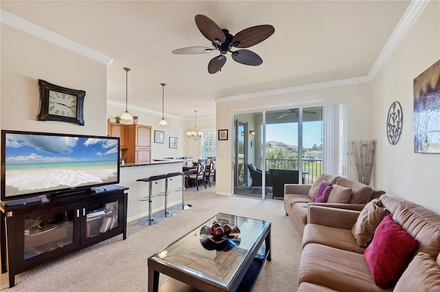 700 Gardens Edge Dr Unit 722, Venice, FL 34285 - living area featuring a ceiling fan, light colored carpet, crown molding, and a chandelier