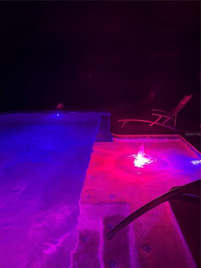 5832 Semolino St, Nokomis, FL 34275 - view of pool at night