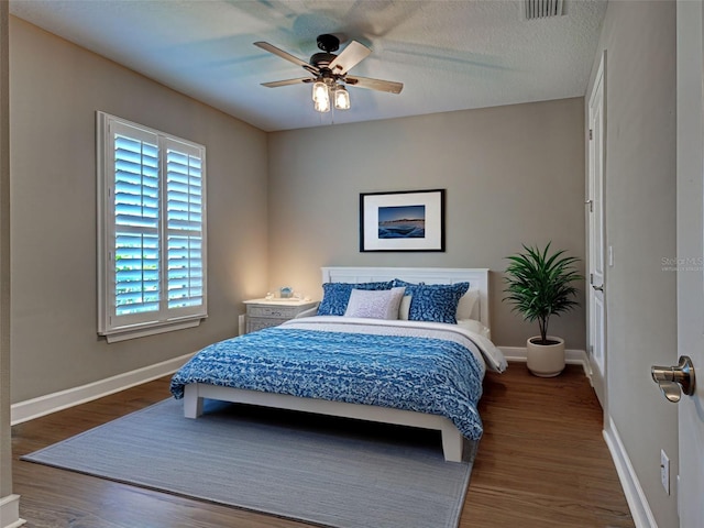 5832 Semolino St, Nokomis, FL 34275 - bedroom with wood finished floors and a ceiling fan