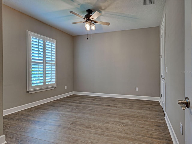 5832 Semolino St, Nokomis, FL 34275 - unfurnished room featuring ceiling fan and wood finished floors