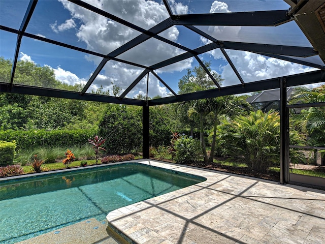 5832 Semolino St, Nokomis, FL 34275 - swimming pool featuring a patio and glass enclosure