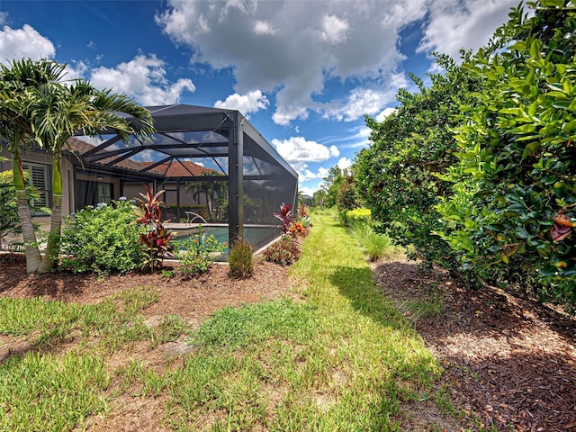 5832 Semolino St, Nokomis, FL 34275 - view of yard featuring an outdoor pool and glass enclosure