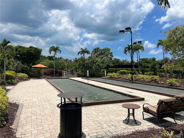 5832 Semolino St, Nokomis, FL 34275 - view of property's community with a bocce ball area and view of scattered trees