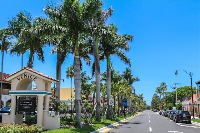5832 Semolino St, Nokomis, FL 34275 - view of asphalt road featuring traffic signs, street lighting, and curbs