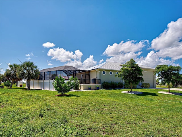 48 Lark Dr, Placida, FL 33946 - view of green lawn featuring glass enclosure