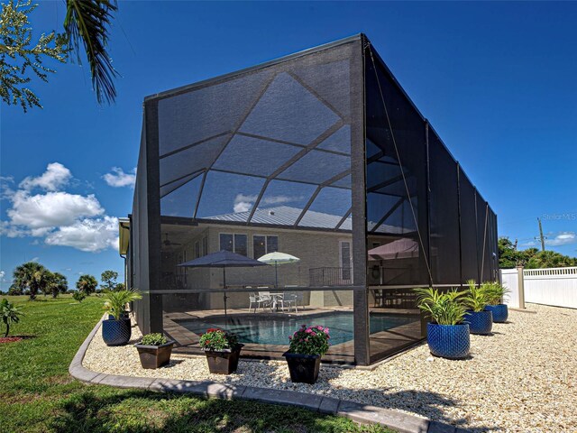 48 Lark Dr, Placida, FL 33946 - rear view of house featuring a patio and a lanai