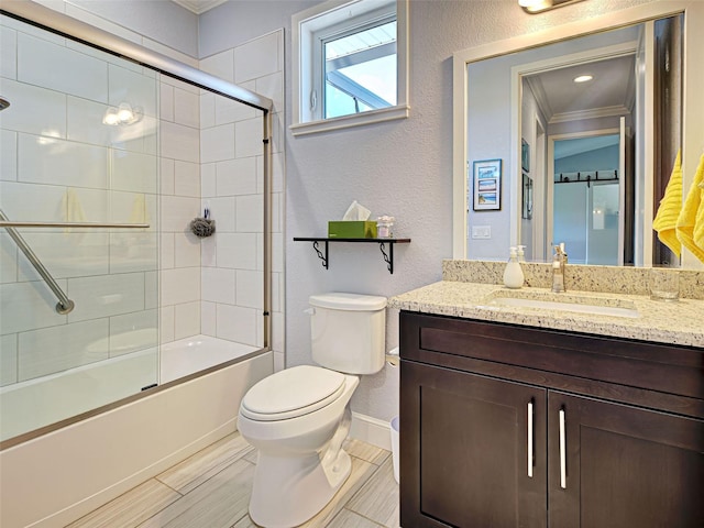 48 Lark Dr, Placida, FL 33946 - bathroom featuring vanity, a textured wall, crown molding, and bath / shower combo with glass door