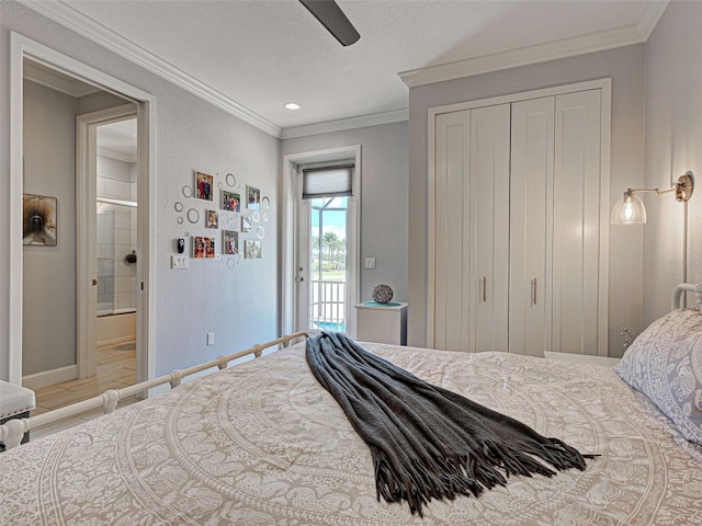 48 Lark Dr, Placida, FL 33946 - bedroom featuring access to exterior, a closet, ensuite bath, ornamental molding, and ceiling fan