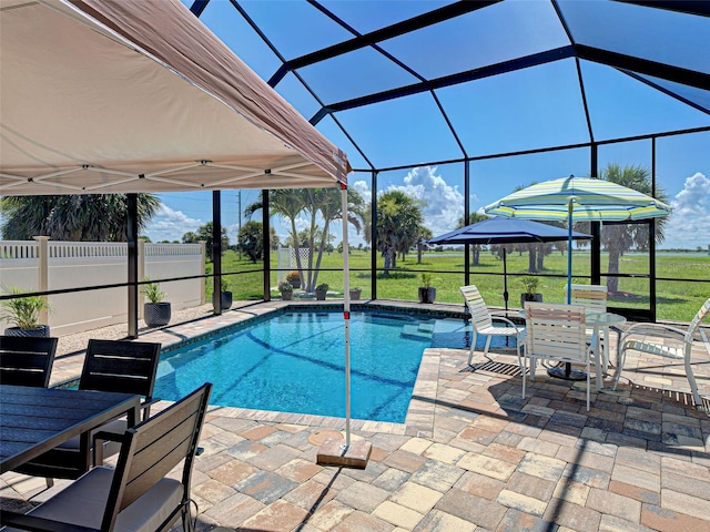 48 Lark Dr, Placida, FL 33946 - outdoor pool featuring outdoor dining space, a patio area, and a lanai