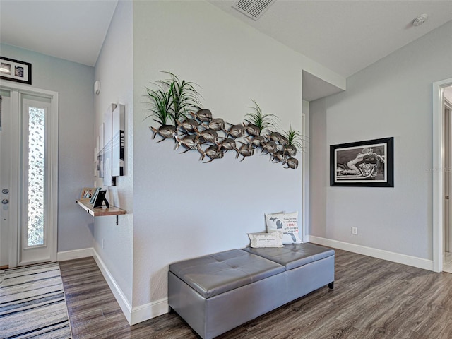 48 Lark Dr, Placida, FL 33946 - entryway with wood finished floors and baseboards