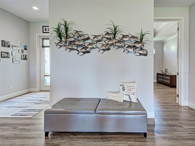 48 Lark Dr, Placida, FL 33946 - corridor with wood finished floors, recessed lighting, and ornamental molding