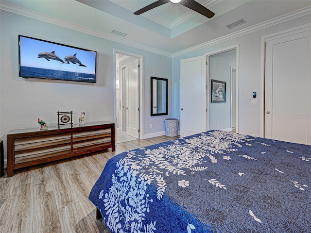 48 Lark Dr, Placida, FL 33946 - bedroom featuring wood finished floors, ornamental molding, and ceiling fan