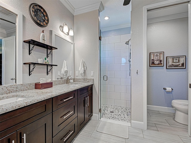 48 Lark Dr, Placida, FL 33946 - bathroom featuring crown molding, a stall shower, double vanity, a textured wall, and tile patterned flooring