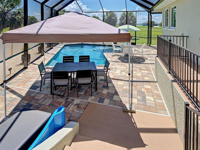 48 Lark Dr, Placida, FL 33946 - view of patio / terrace featuring outdoor dining area and a lanai