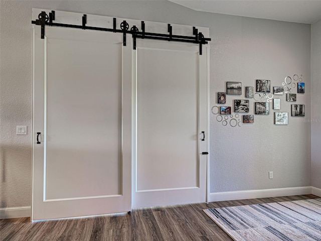 48 Lark Dr, Placida, FL 33946 - interior space featuring wood finished floors and a textured wall