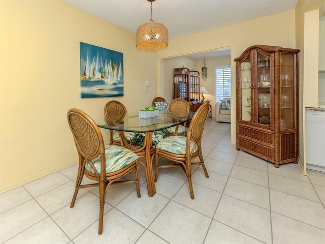 168 The Corso Unit 168, Venice, FL 34285 - dining area with light tile patterned flooring