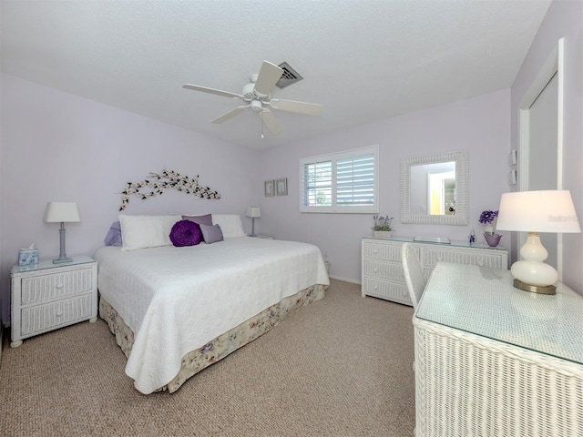 168 The Corso Unit 168, Venice, FL 34285 - carpeted bedroom featuring a ceiling fan