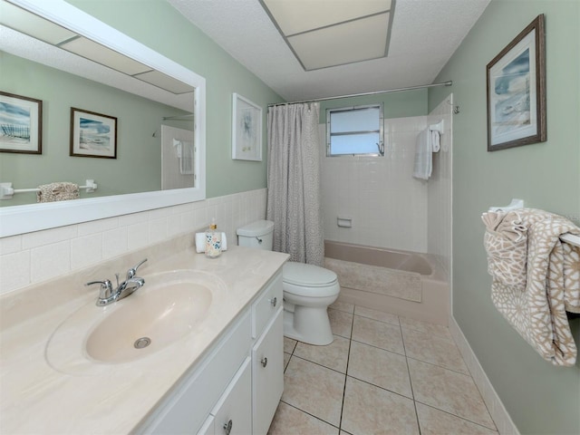 168 The Corso Unit 168, Venice, FL 34285 - bathroom featuring vanity, shower / bath combo with shower curtain, and tile patterned flooring