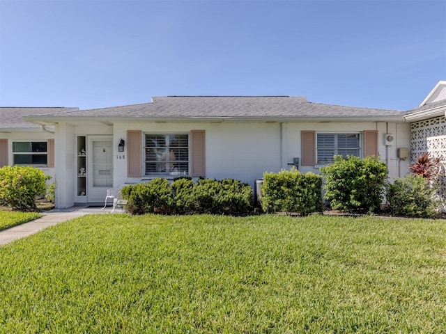 168 The Corso Unit 168, Venice, FL 34285 - single story home featuring a front lawn