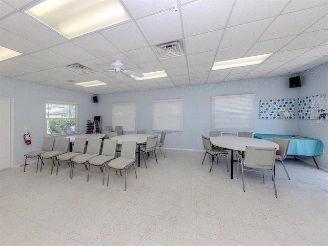 168 The Corso Unit 168, Venice, FL 34285 - dining space with a ceiling fan and a drop ceiling
